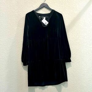 Divided black dress top size s